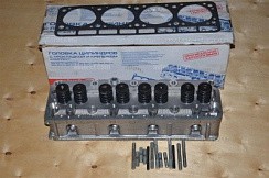 Фото (402-3906562) Головка блока цилиндров 3302,3110 дв.ЗМЗ-402 (А-92) в сборе с прокл.и креп.